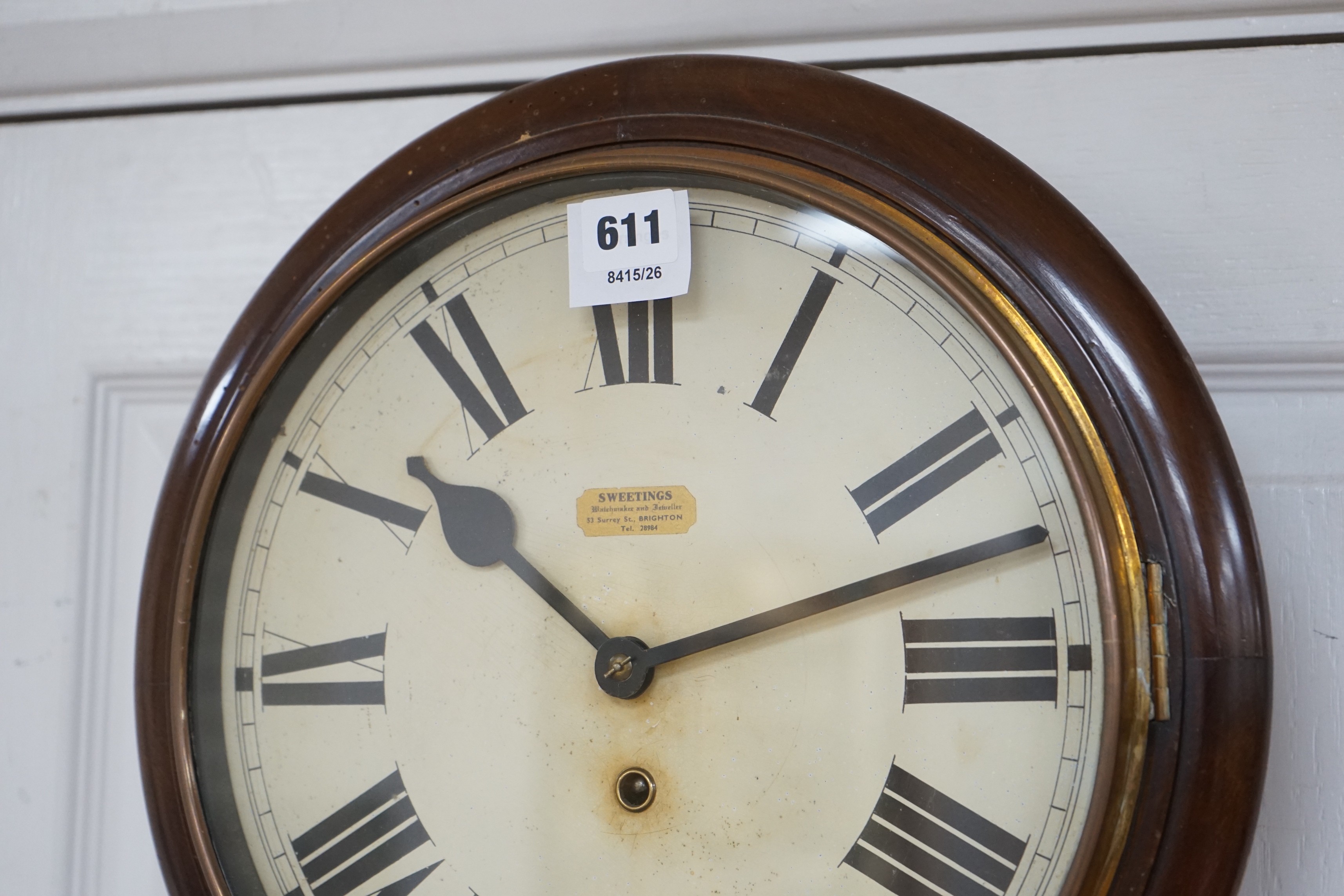 An early 20th century mahogany wall clock, 37cm diameter